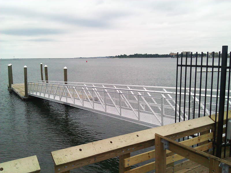 Aluminum gangway from shore to dolphin.