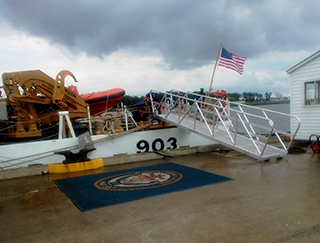 Located at the First District Coast Guard Station. The Escabana, Superior Docks brow, and landing platform.