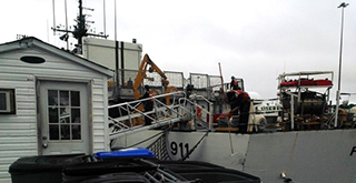 Located at the First District Coast Guard Station. The Escabana, Superior Docks brow, and landing platform.