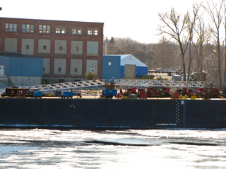 aluminum gangways go between a set of dolphins