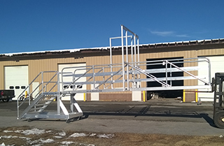 Aluminum gangway from shore to dolphin.
