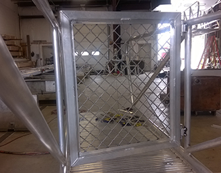 Aluminum gangway from shore to dolphin.